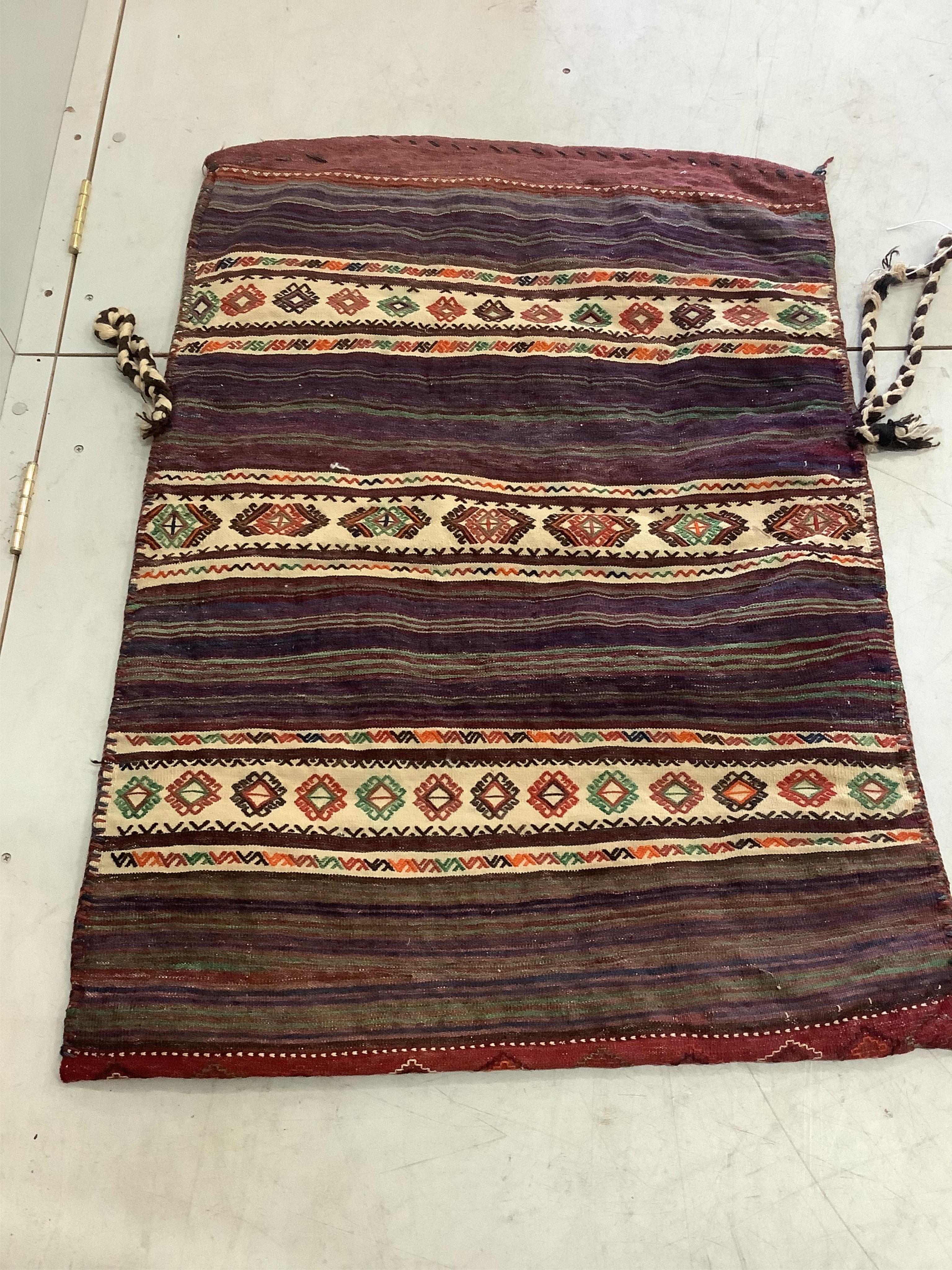 A Soumak double saddle bag and a similar salt bag, larger 128 x 90cm. Condition - fair to good